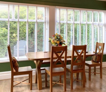 Grasmere Solid Oak Dining Chairs combined with a matching country oak dining table making a great looking dining set. Stunning photo from a recent customer.